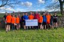 The Pendle Trail Runners donated £250 to the mountain rescue team