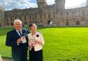 Bill and Janet Heap with their medals at Windsor Castle