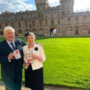 Bill and Janet Heap with their medals at Windsor Castle