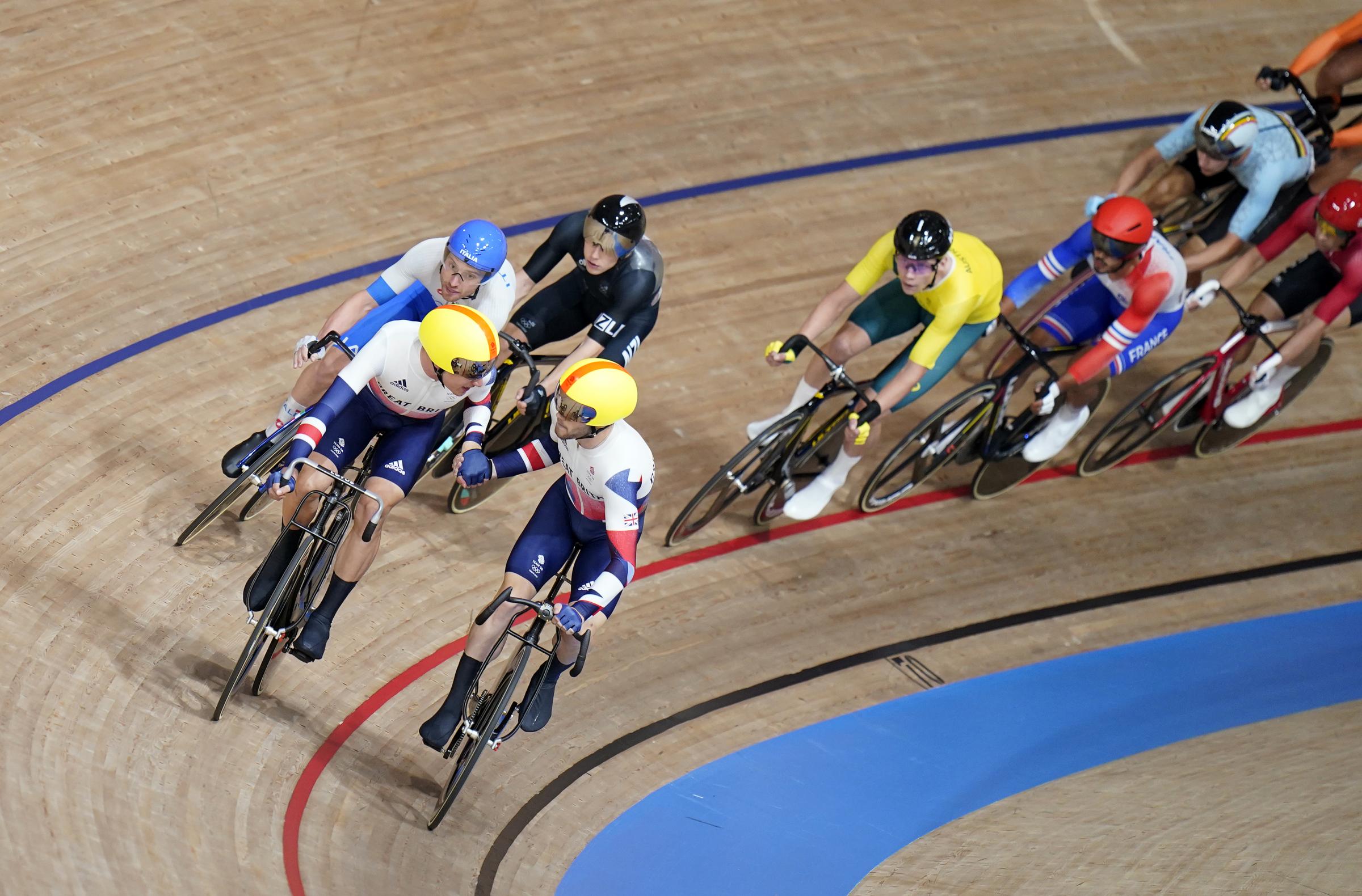 Matt Walls, right, with Ethan Hayter during the chaos that is the Olympic Madison