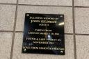 The plaque is in memory of John Kilbride, who was murdered at the age of 12
