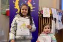 Nella Piroskova and Michaela Minarikova enjoyed colouring in at the branch
