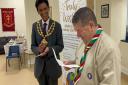 Stephen Exton being presented with his wish by mayor of Oldham Cllr Zahid Chauhan
