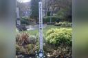 The peace pole in St Chad's Gardens in Uppermill