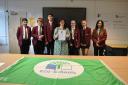 Lisa Lott, centre, with eco-committee members of Hathershaw College and the green flag award