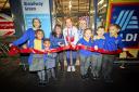 Sarah Jones, centre, opened the store alongside staff and pupils at St Luke's Church of England Primary School