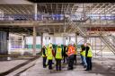 Traders and Cllr Arooj Shah are given a tour of the new site by Willmott Dixon - the construction company carrying out the redevelopment