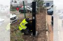 An electric vehicle charging point being inspected at Stiebel Eltron's Bromborough headquarters