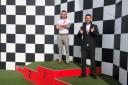 POLE position: Kilian Maddison and Danny Robinson, from Danny & Co Barbers during their visit to Silverstone to secure a pop-up barber shop deal.
