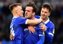 Jose Baxter (centre) celebrates scoring against Stevenage at Boundary Park in his second spell with Latics