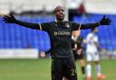 Oldham Athletic's Dylan Bahamboula celebrates scoring his side's second goal of the game.