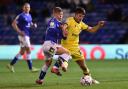Oldham Athletic's Harry Vaughan tussles with Charlie Jolley of Tranmere Rovers during the EFL2 game at Boundary Park between Oldham and Tranmere Rovers