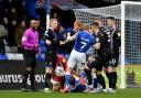 Tensions mounted in the basement battle between Latics and Carlisle