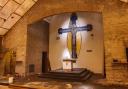 The mural was painted in 1955 and now sits in the Oldham church. Image by Historic England.