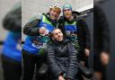 Former Leeds Rhinos player Rob Burrow (centre) supports Kevin Sinfield (right) during an ultra-marathon