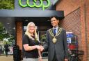 Store manager Amy Anderson with Oldham mayor Cllr Chauhan