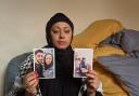 Afshan Abubakar, holding photos of her fiancé Hani