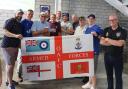 Members of the Veterans Supporters Group with Oldham Athletic owner Frank Rothwell, third from left