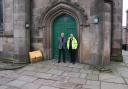 Vicar Daniel Burton and Stuart Lowe, contacts director at Rowan Ashworth Ltd, stand on the new ramp