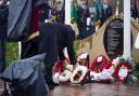 Wreaths were laid at the plaque honouring the victims
