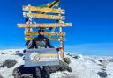 Akke Rahman at the top of Mt Kilimanjaro