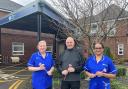 Steve Gallagher supporting Dr Kershaw’s Rose to Remember Appeal  in memory of his sister Debby with staff nurses, Sam and Bindhu