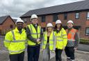 From left to right: Keith McFarlane of First Choice Homes Oldham, Lee Catterall of Sigma Capital Group, Ellie Frith, Joanne Robertson and Neil Jones, all of Kellen Homes