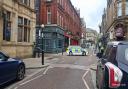 The police cordon in place on Silver Street in Bury on Sunday