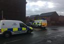 Police vans on Elgin Street in Halliwell following the incident