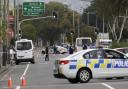 Police block the road near the shooting at a mosque in Linwood, Christchurch, New Zealand. Picture: AP Photo