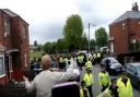 Specialist detectives join investigation into violent clashes at Tommy Robinson visit