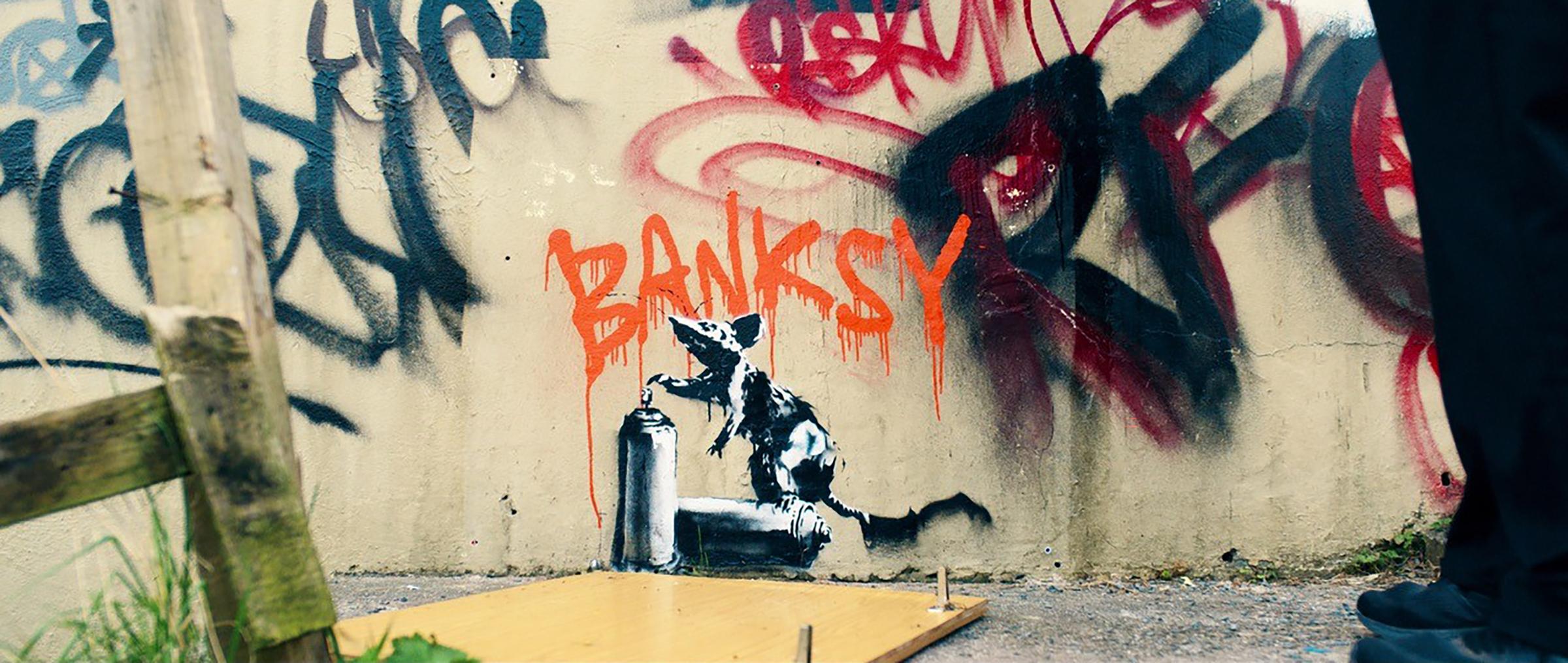 A Banksy artwork that went on to be painted over as part of the BBC show The Outlaws (Image: PA)