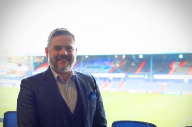 Director of FLG, Simon Brooke, at Boundary Park, where the venue is based