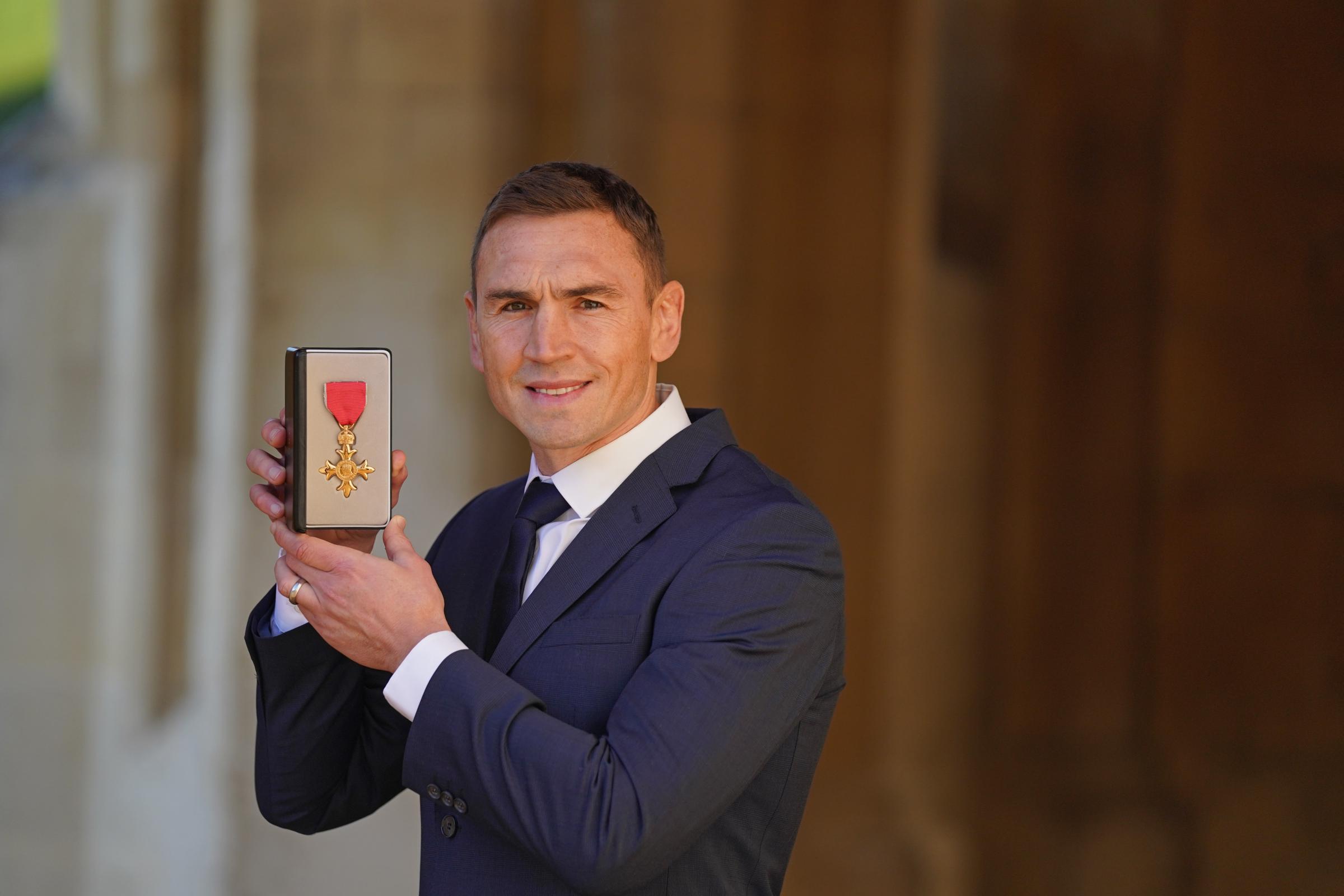 Kevin Sinfield with his OBE award (Steve Parsons/PA)