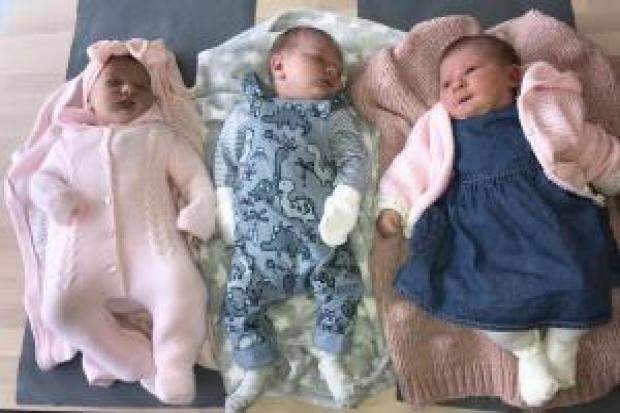 FRIENDS: Indie-Rose, left, Oliver James, middle, and Aurora Harper were born just days apart in Bolton