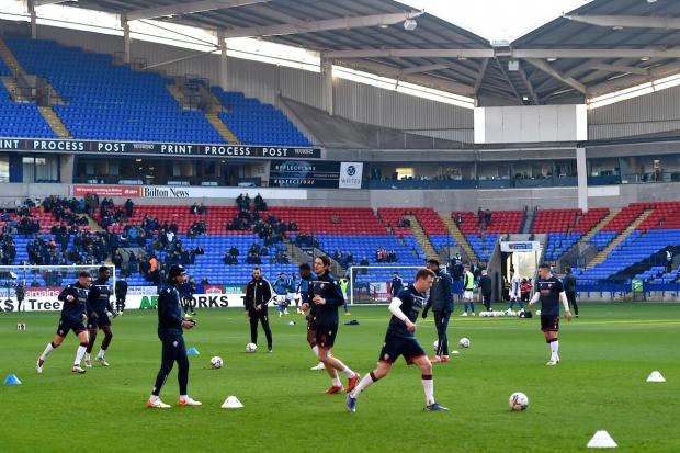 Wanderers players warm-up before the game against Ipswich Town