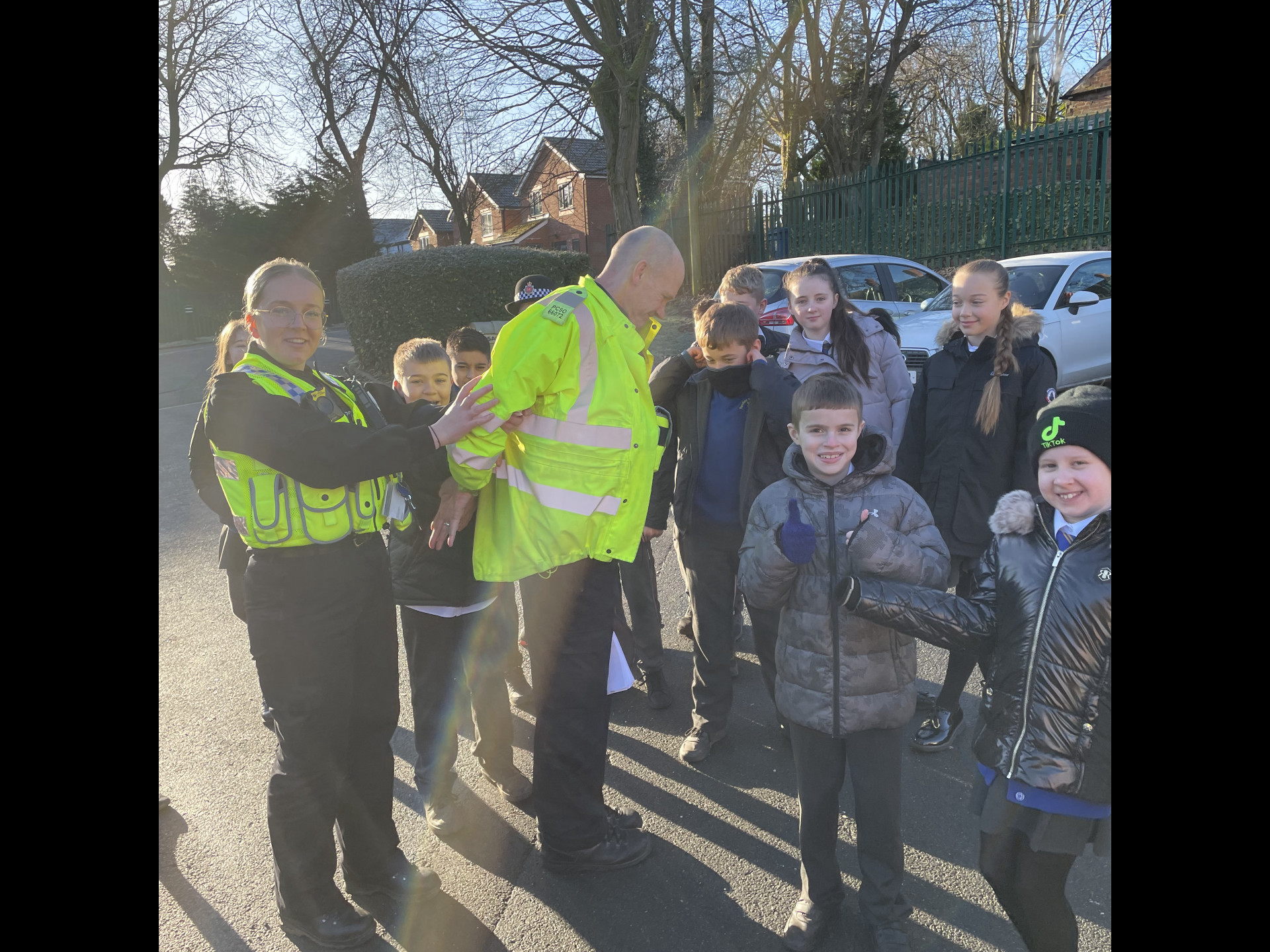 Police officers with children at Parkfield Primary School in Middleton