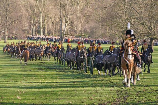 The Oldham Times: Members of the King's Troop, Royal Horse Artillery leave Green Park in central London, following the gun a salute. Picture: PA