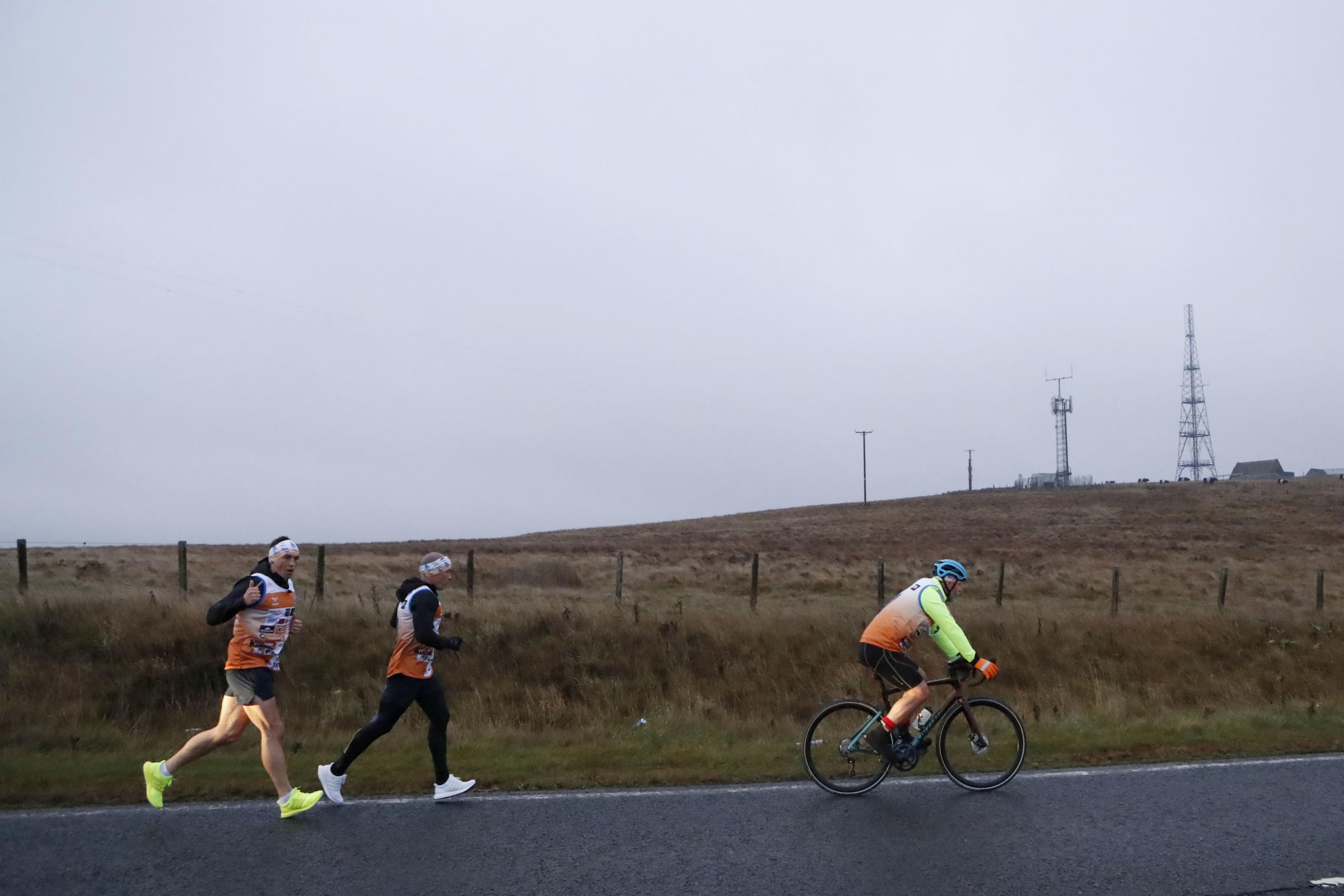 Kevin Sinfield (left) makes his way towards Kirkwhelpington in Northumberland during day three of the Ultra 7 in 7 Challenge from Otterburn to Chester-Le-Street (Picture: Will Matthews/PA Wire) 