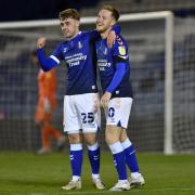 Alfie McCalmont (left) scored 10 goals on loan with Latics from Leeds in 2020/21