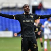 Oldham Athletic's Dylan Bahamboula celebrates scoring his side's second goal of the game.