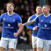 Oldham's Hallam Hope celebrates his goal in the win over Bradford City