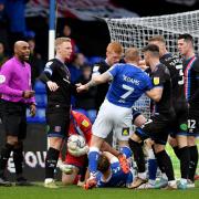 Tensions mounted in the basement battle between Latics and Carlisle