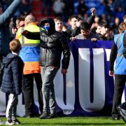 Latics fans invade the pitch at Oldham Athletic