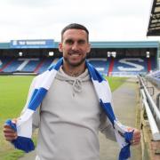 Liam Hogan has signed a two-year deal with Latics