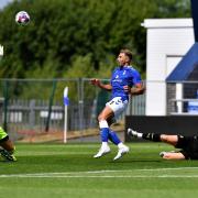Hallam Hope opens the scoring for Oldham Athletic against Wigan Athletic. Pictures by Eddie Garvey