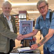 Author Rob Hargreaves (right) was joined by Graham Briggs (left), a supporter of the International Brigade Memorial Trust, at the signing.