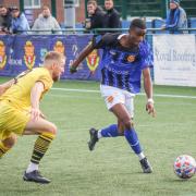 ON THE RUN: Michael Afuye on the attack against Wythenshaw Town Picture: Jamie Ross