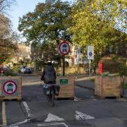 A low traffic neighbourhood trial in London, which uses planters to help stop motor traffic.