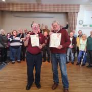 John Holden, left, with Terry Lawless holding his winning certificates at Dobcross Band and Social Club